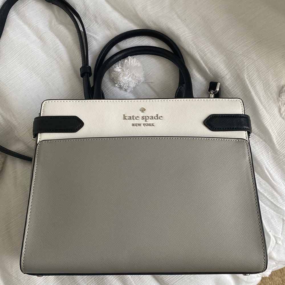 Kate Spade tri-color leather handbag with detachable crossbody strap.